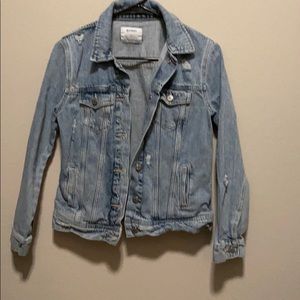 Distressed denim jacket